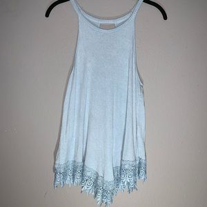 Light blue tank top with lace at the bottom